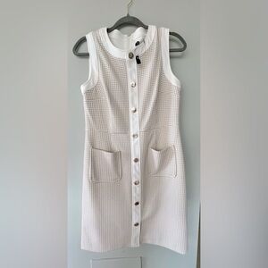 Gold buttons on this classic style dress your best